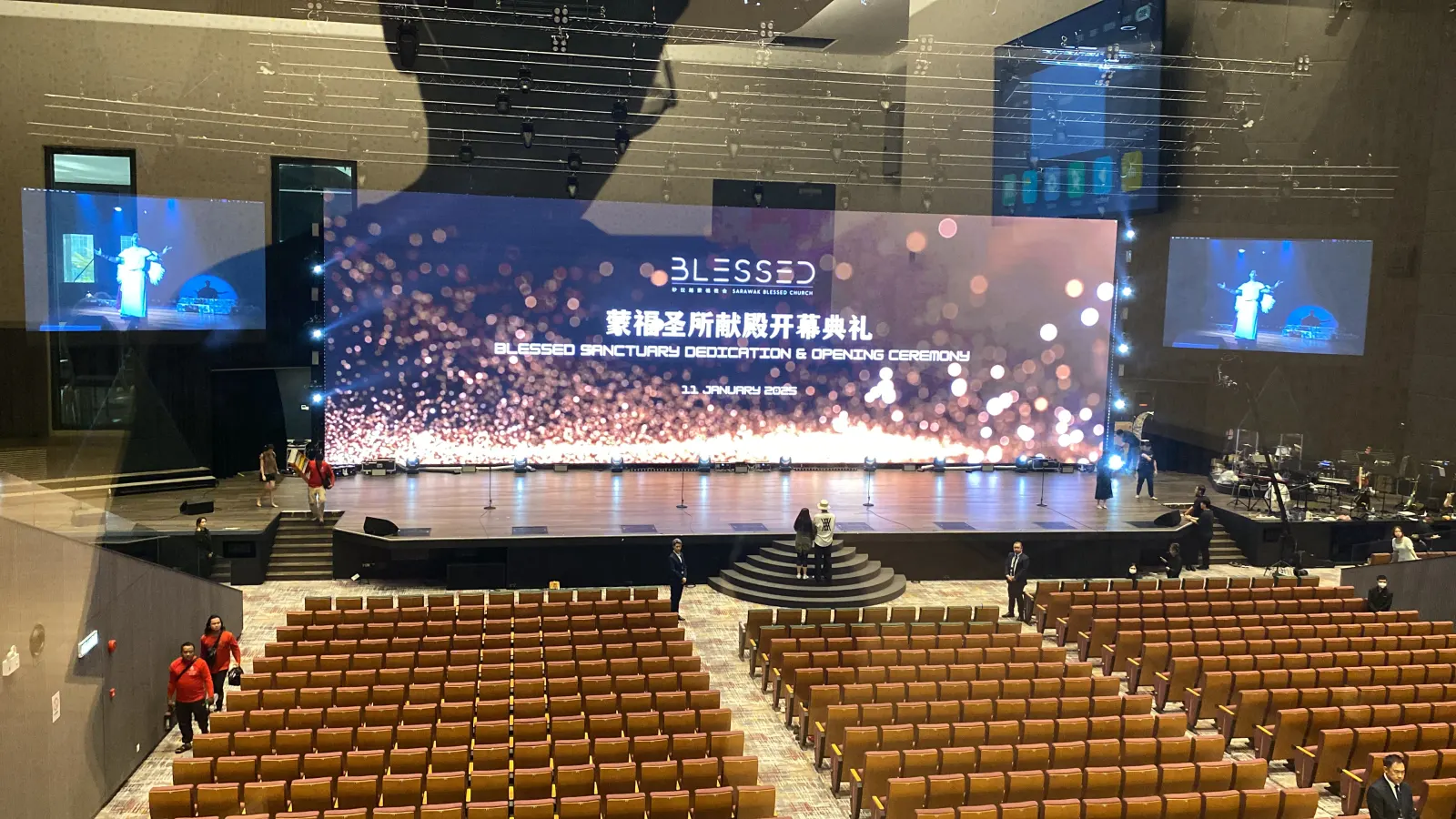 Blessed Church sanctuary stage with a full-width LED screen and lighting rig during the Blessed Sanctuary Dedication and Opening Ceremony